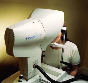 patient having eyes scanned with WaveScan machine for custom LASIK 