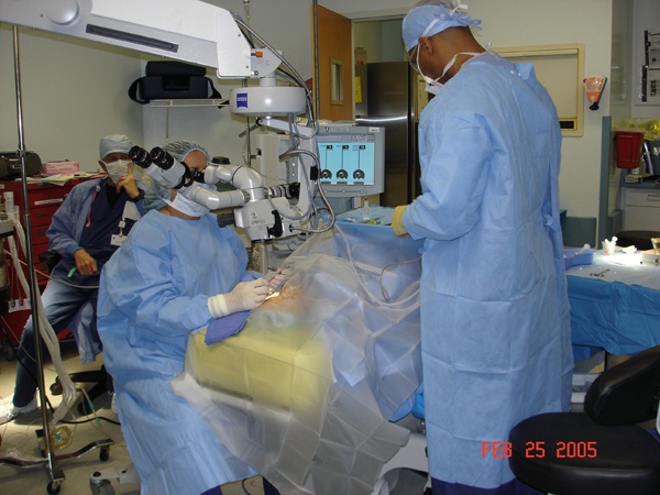 Doctors performing cataract surgery