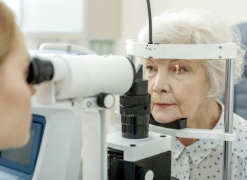 Ophthalmologist performing eye examination.