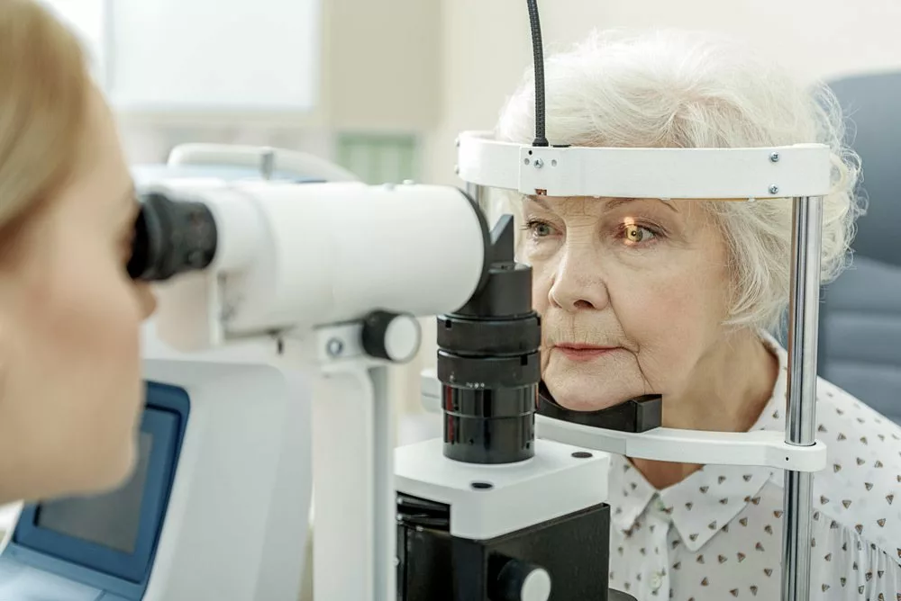 Ophthalmologist performing eye examination.