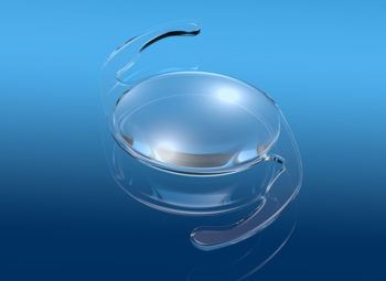 close up view of intraocular lens on blue background
