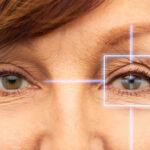 middle-aged woman's eyes with crosshairs over one