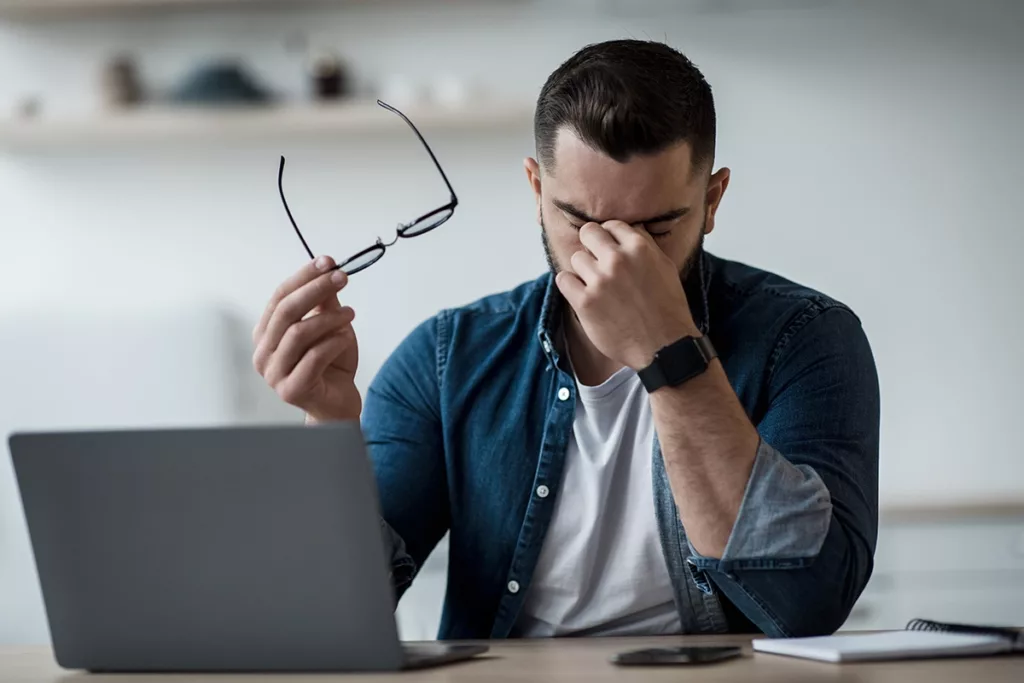 Man with glasses has ocular migraine