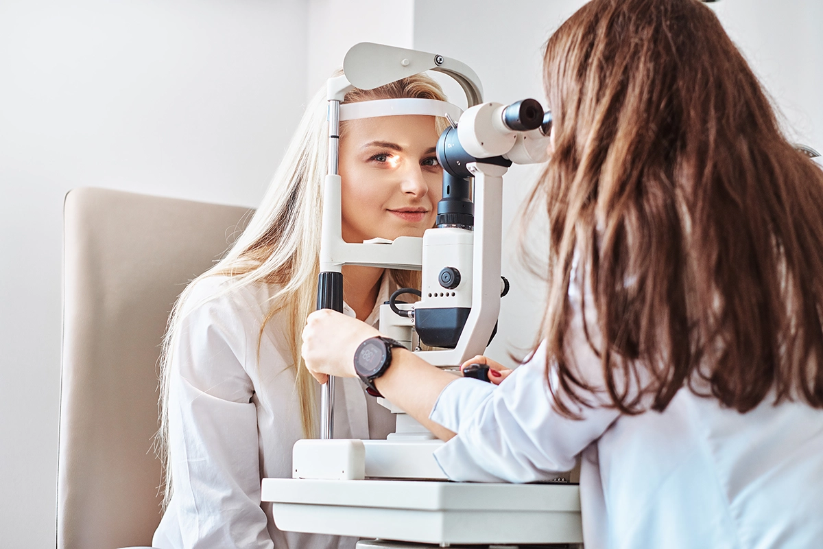 Woman seeing an optometrist for an eye exam